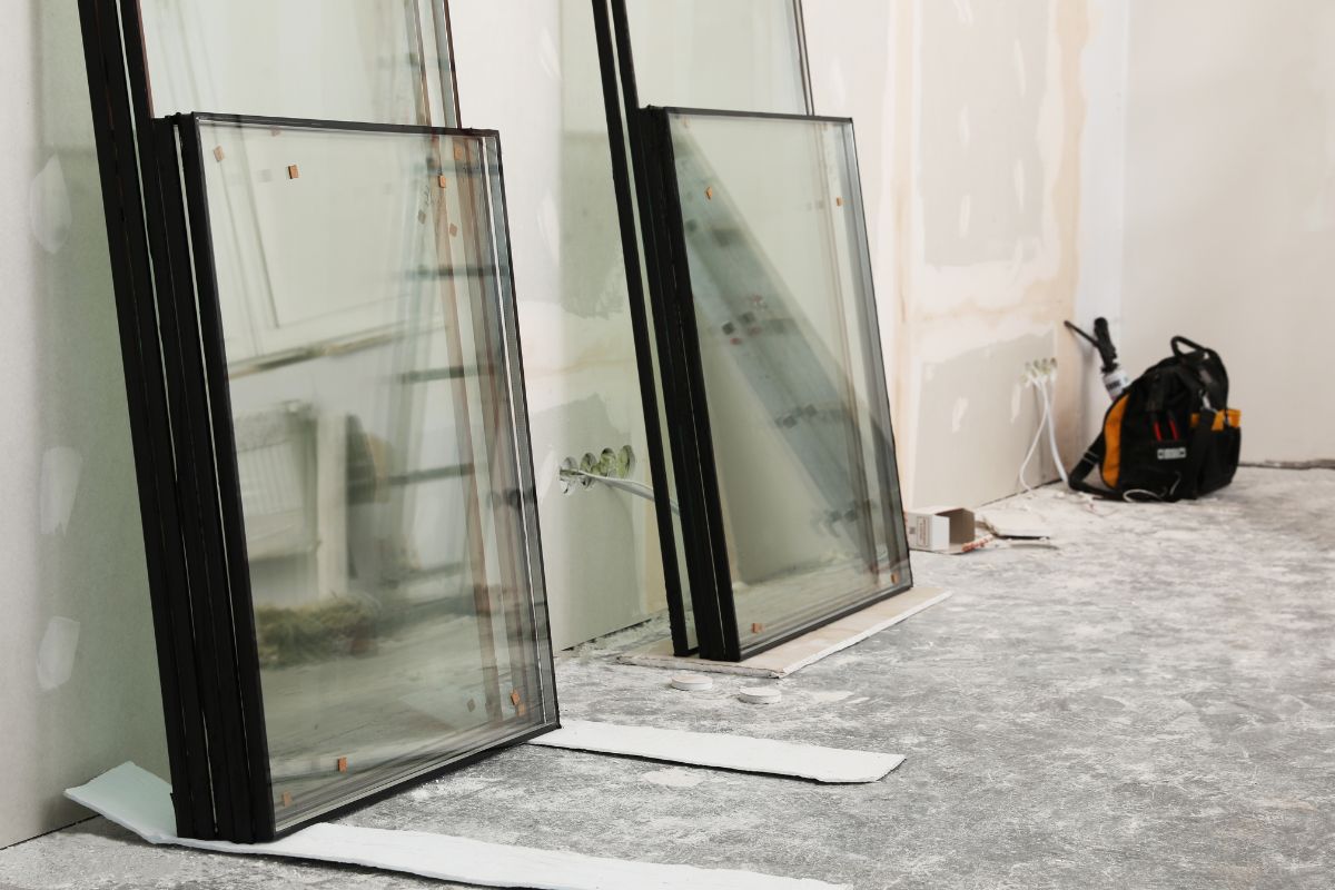 Technician performing glass door repair